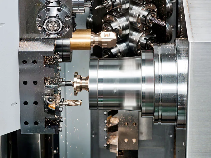 GenTurn 52-BY2 B-axis tooling cutting a turned part
