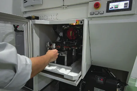 Loading tools into the PM320 magazine from the back of the machine