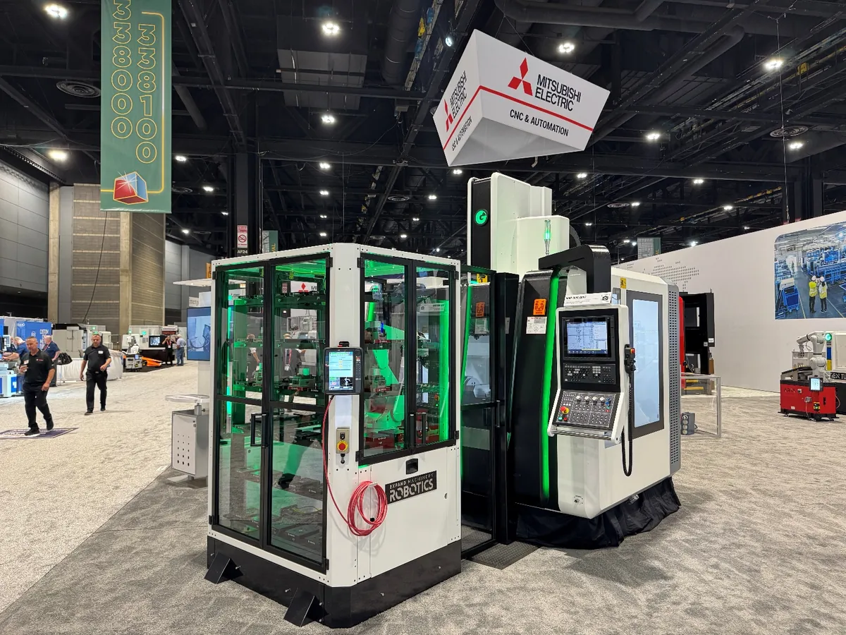 GEN MILL 5X-12 and Expand Robotics cell on a trade show floor