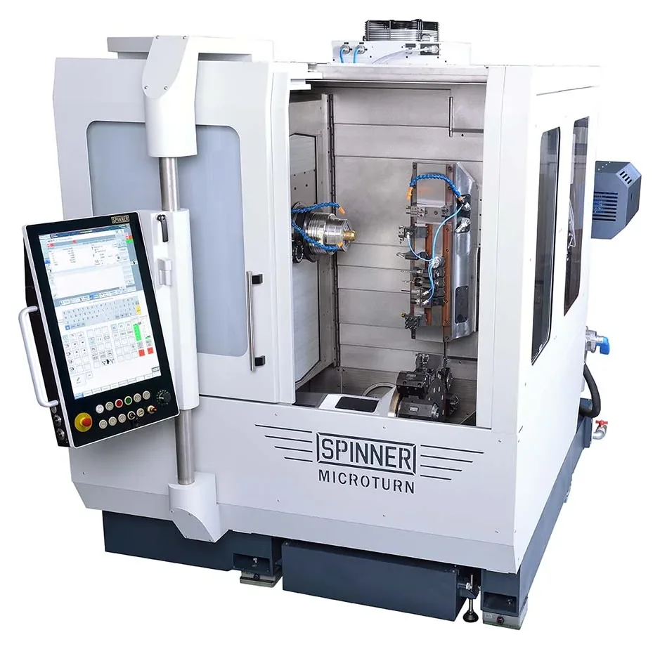 Spinner MicroTurn LT single-spindle ultra-precision lathe, door open: main spindle, gang tooling plate and lower turret