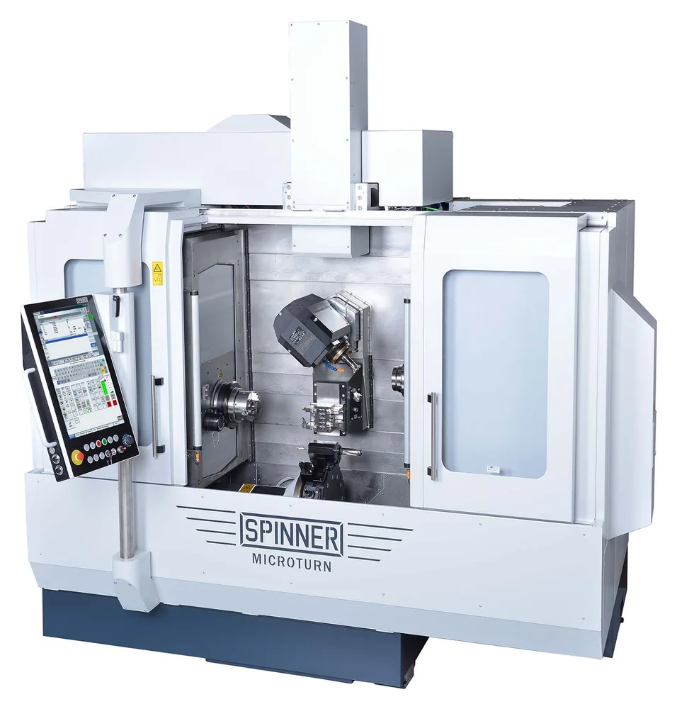 Spinner MicroTurn LTBS twin-spindle ultra-precision turn-mill center, doors open: opposed spindles, B-axis milling head, gang table and turret