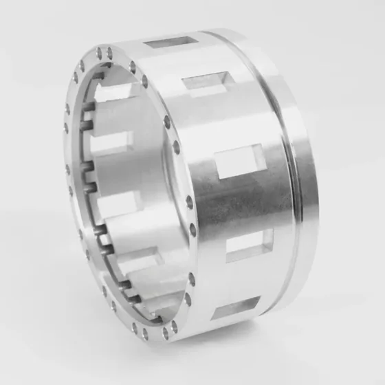 Slotted ring turned on a Spinner lathe: rectangular windows and a drilled bolt circle